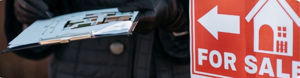 Homebuyers reviewing MLS real estate listings and Canadian real estate for sale options