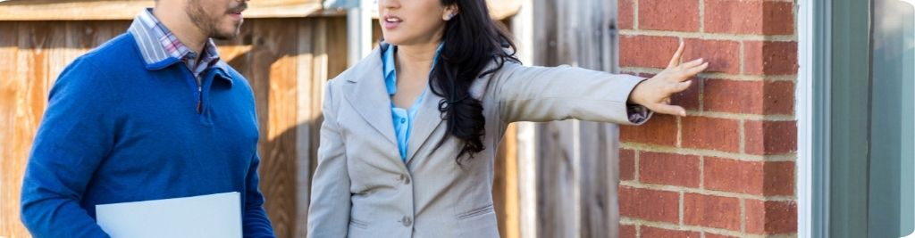 Home inspections in Ontario inspector reviewing Canadian real estate property